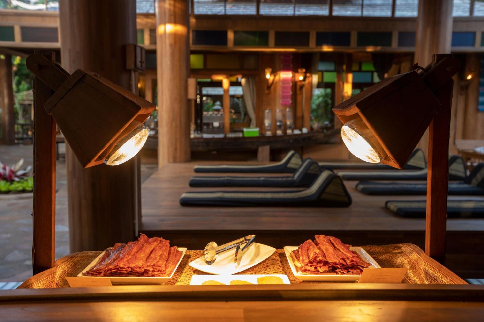 Santhiya Koh Phangan Resort And Spa Exteriér fotografie A chafing dish with bacon